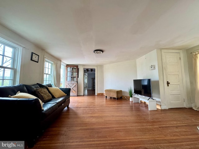 living area with wood finished floors