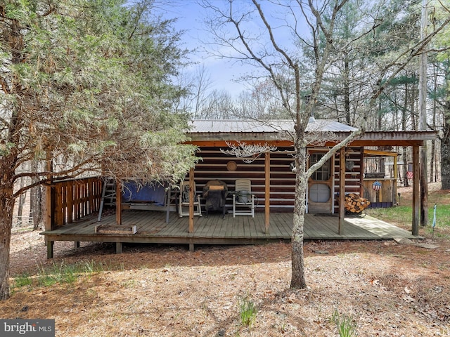 29 Roy Guinn Rd, Points, WV 25437 - back of property with a deck and metal roof