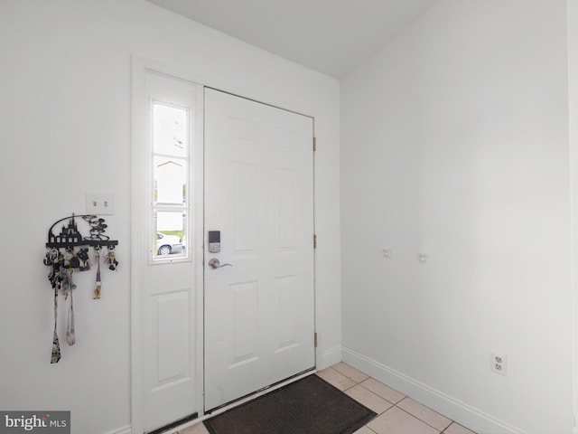 9 Honeysuckle Dr, Newark, DE 19702 - entryway with light tile patterned floors and baseboards