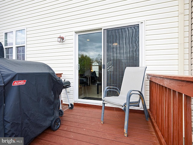 deck featuring a grill