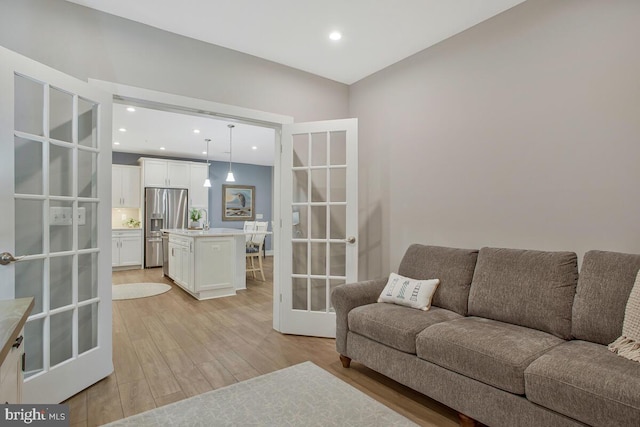170 Harrier Way Unit 32, Chester, MD 21619 - living room featuring recessed lighting, light wood-type flooring, and french doors