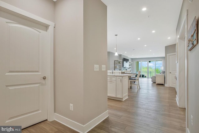 170 Harrier Way Unit 32, Chester, MD 21619 - hallway with light wood-type flooring, baseboards, and recessed lighting
