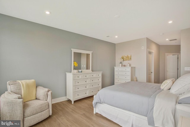 170 Harrier Way Unit 32, Chester, MD 21619 - bedroom with light wood finished floors, baseboards, and recessed lighting