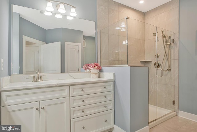 170 Harrier Way Unit 32, Chester, MD 21619 - full bathroom featuring baseboards, vanity, tile patterned flooring, and a stall shower