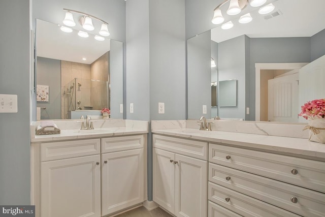 170 Harrier Way Unit 32, Chester, MD 21619 - bathroom with a tile shower, vanity, and visible vents