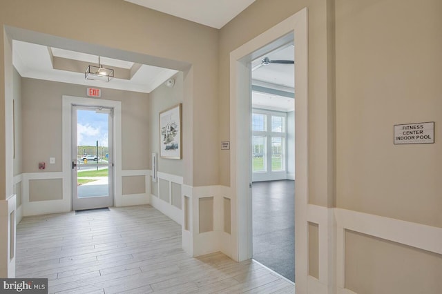 170 Harrier Way Unit 32, Chester, MD 21619 - doorway to outside with a ceiling fan, wood finished floors, and a raised ceiling