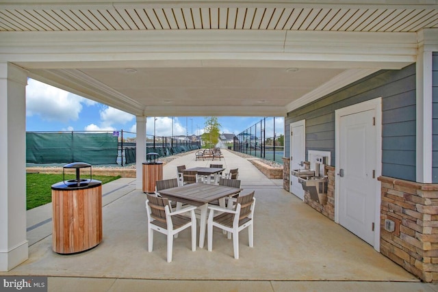 170 Harrier Way Unit 32, Chester, MD 21619 - view of patio / terrace featuring outdoor dining space, area for grilling, and fence