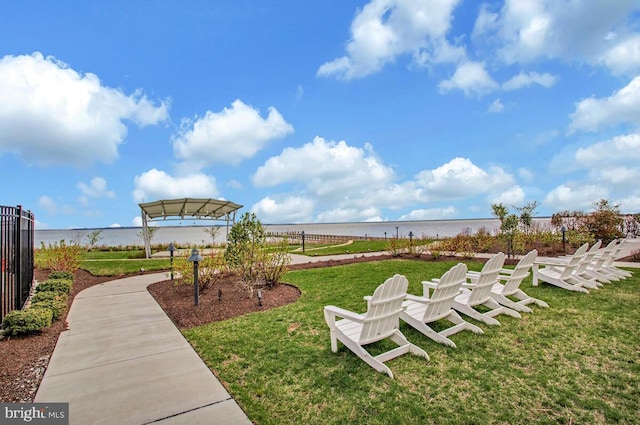 170 Harrier Way Unit 32, Chester, MD 21619 - view of community featuring a yard, a water view, and fence