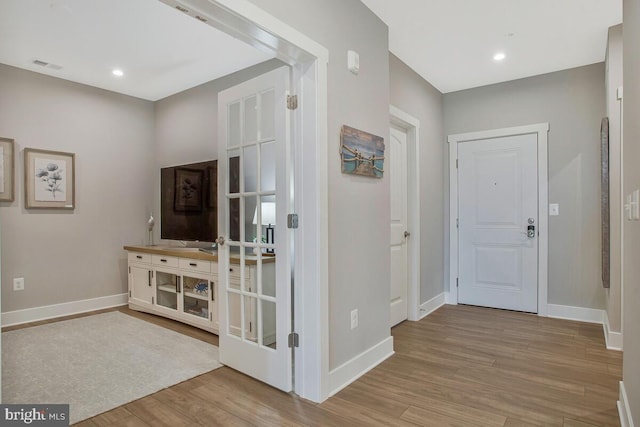 170 Harrier Way Unit 32, Chester, MD 21619 - foyer with visible vents, baseboards, and wood finished floors
