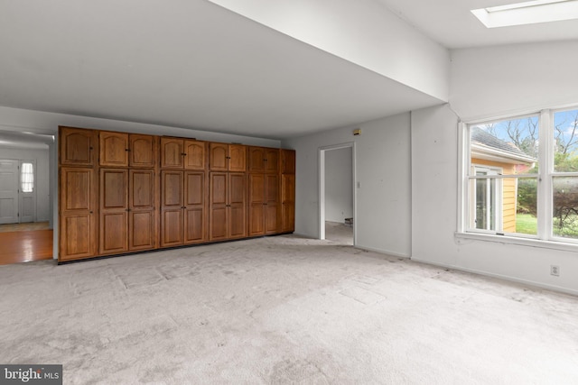 29 Foxcroft Dr, Princeton, NJ 08540 - unfurnished living room with a skylight and light carpet