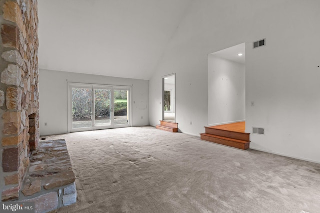29 Foxcroft Dr, Princeton, NJ 08540 - unfurnished living room with high vaulted ceiling, carpet flooring, and visible vents
