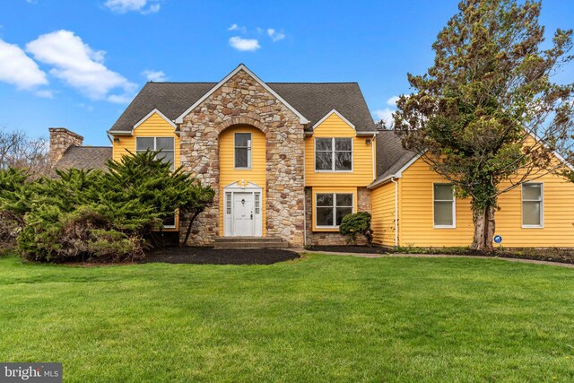 29 Foxcroft Dr, Princeton, NJ 08540 - traditional home with roof with shingles, stone siding, and a front lawn