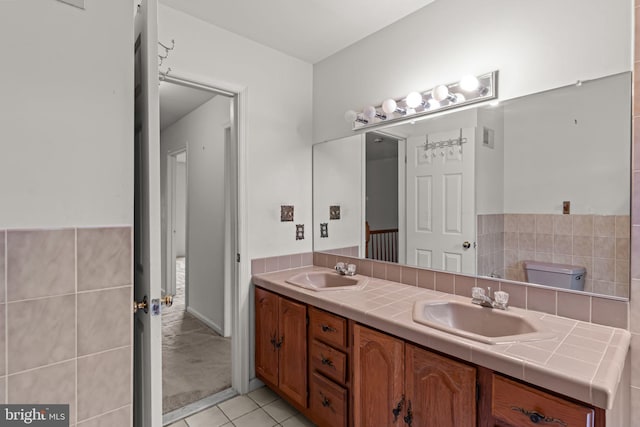 29 Foxcroft Dr, Princeton, NJ 08540 - bathroom with tile patterned floors, double vanity, and a sink