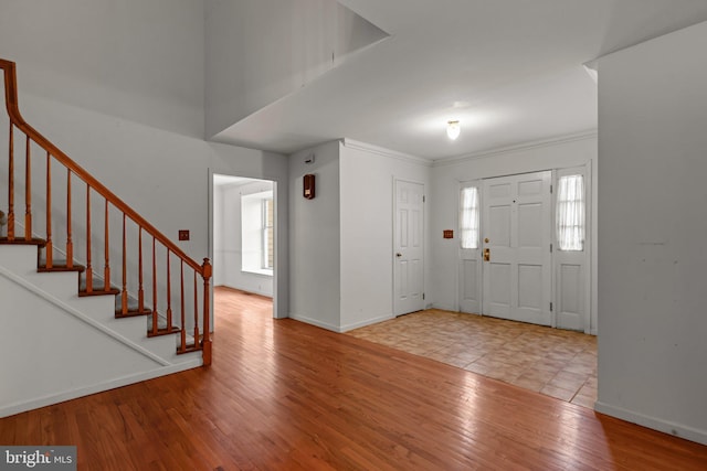 29 Foxcroft Dr, Princeton, NJ 08540 - foyer entrance featuring stairway, baseboards, crown molding, and wood finished floors