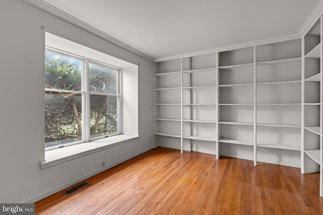 29 Foxcroft Dr, Princeton, NJ 08540 - spare room with plenty of natural light, visible vents, built in features, and wood finished floors