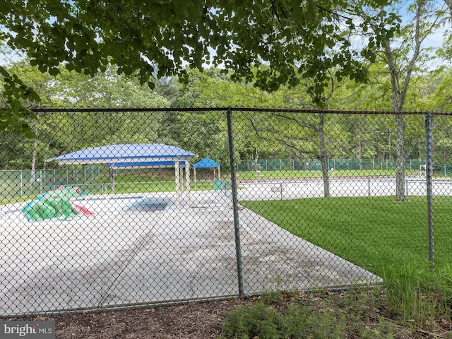 view of pool with fence