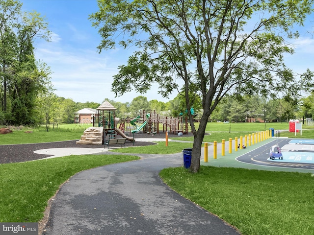 surrounding community featuring a lawn