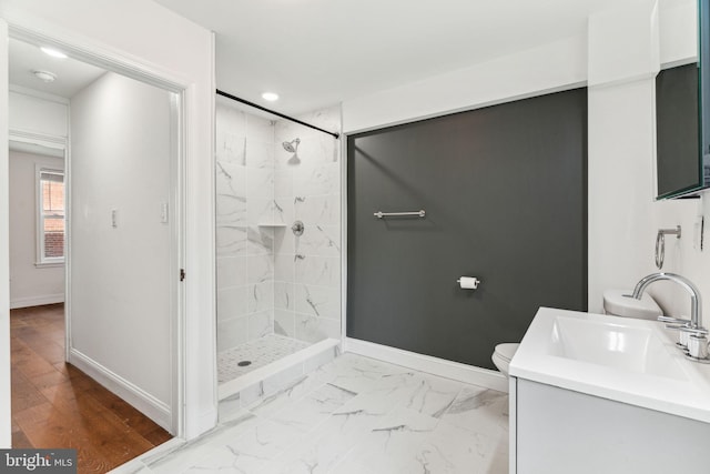 full bathroom with baseboards, recessed lighting, toilet, a shower stall, and marble finish floor