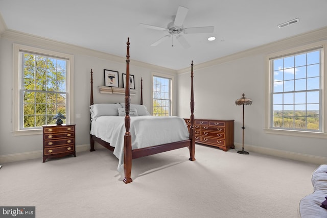 bedroom featuring visible vents, ornamental molding, and baseboards