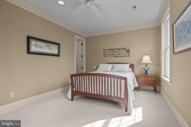 bedroom featuring visible vents, ceiling fan, baseboards, carpet floors, and ornamental molding