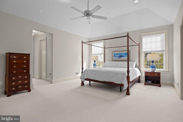 carpeted bedroom featuring baseboards, a ceiling fan, and lofted ceiling