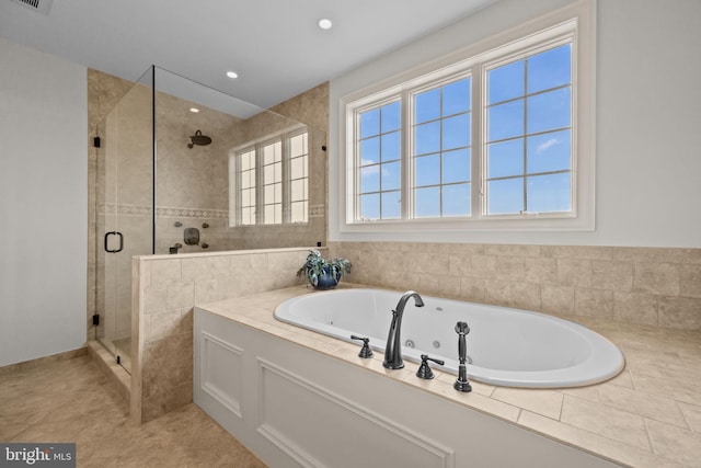 full bath featuring tile patterned floors, visible vents, a stall shower, recessed lighting, and a tub with jets