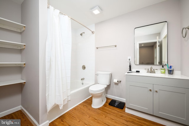 full bath featuring baseboards, toilet, vanity, shower / bathtub combination with curtain, and wood finished floors