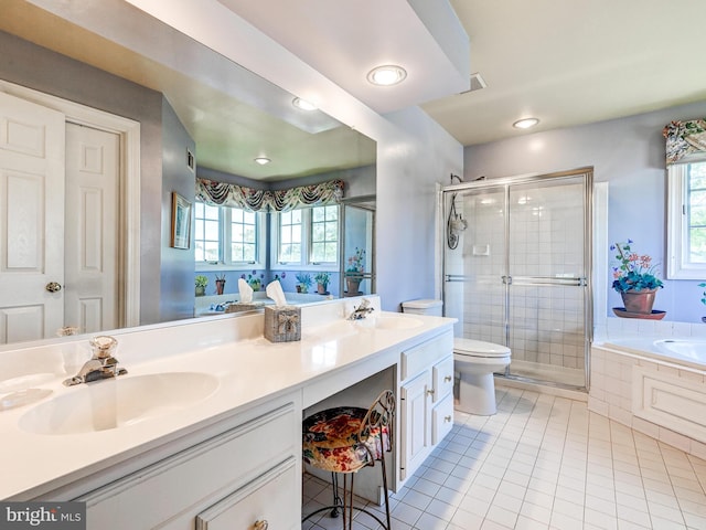 full bath featuring tile patterned flooring, a sink, a stall shower, and double vanity