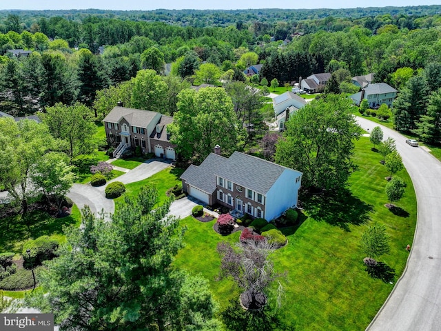 bird's eye view featuring a forest view