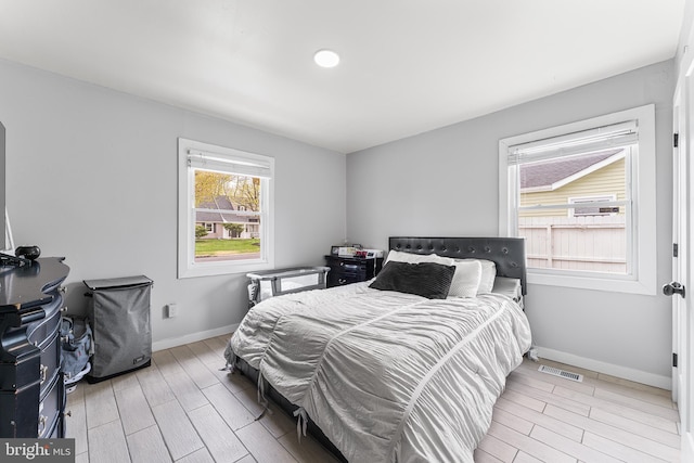 11 New Coach Pl, Willingboro, NJ 08046 - bedroom with wood tiled floors and baseboards
