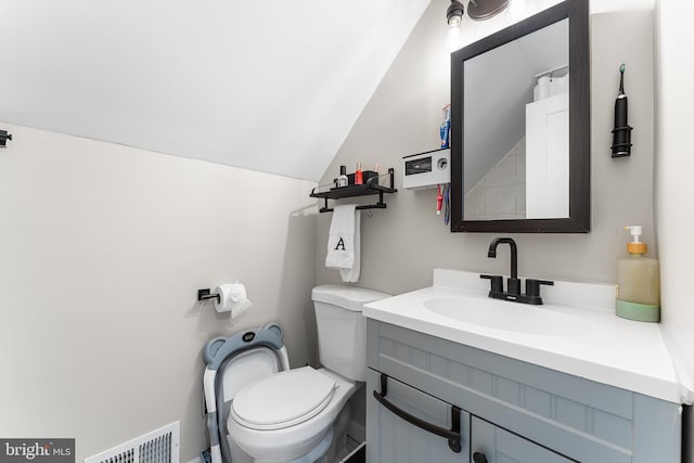 11 New Coach Pl, Willingboro, NJ 08046 - bathroom with vaulted ceiling, vanity, and toilet