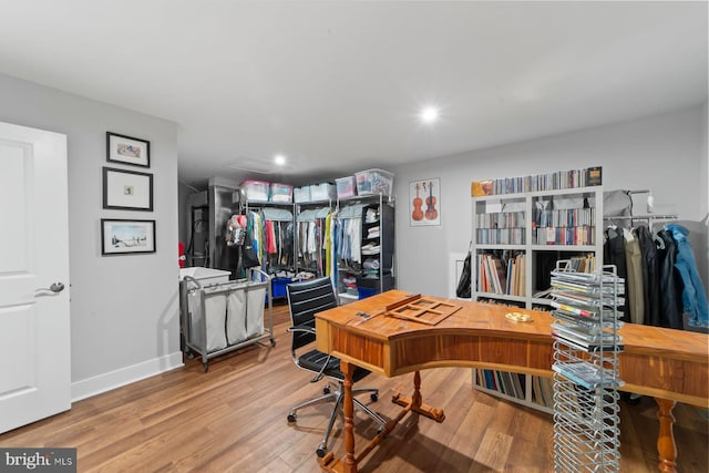 office area featuring recessed lighting, wood finished floors, and baseboards