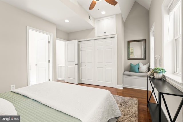 bedroom with visible vents, dark wood finished floors, baseboards, a closet, and recessed lighting