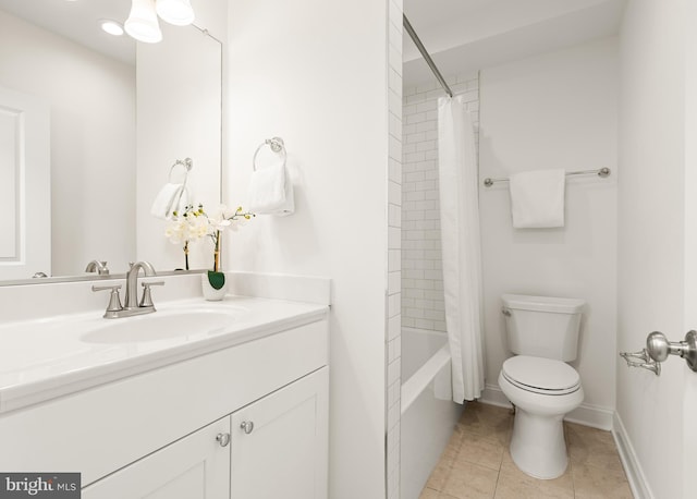 full bathroom featuring vanity, tile patterned flooring, toilet, and shower / bathtub combination with curtain