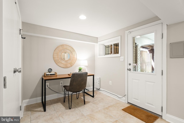 office with baseboards, recessed lighting, and light tile patterned floors