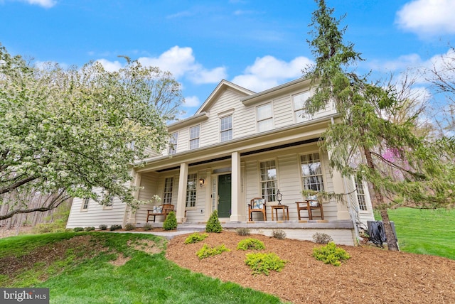 11820 Popes Head Rd, Fairfax, VA 22030 - view of front of house with a porch and a front yard