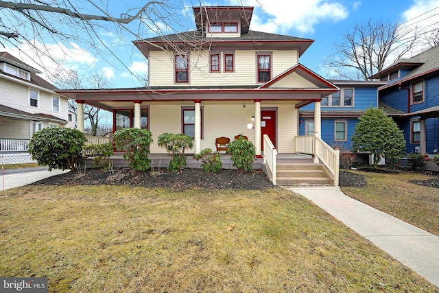 italianate house with a porch and a front yard