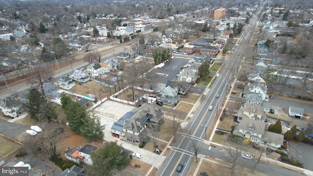 birds eye view of property with a residential view