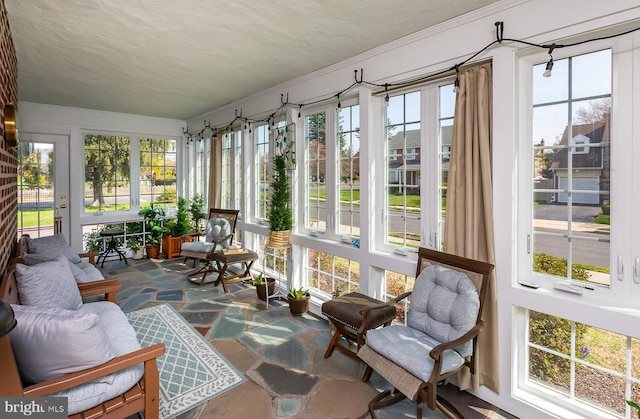 538 Gainsboro Rd, Drexel Hill, PA 19026 - sunroom featuring ornamental molding and stone floors