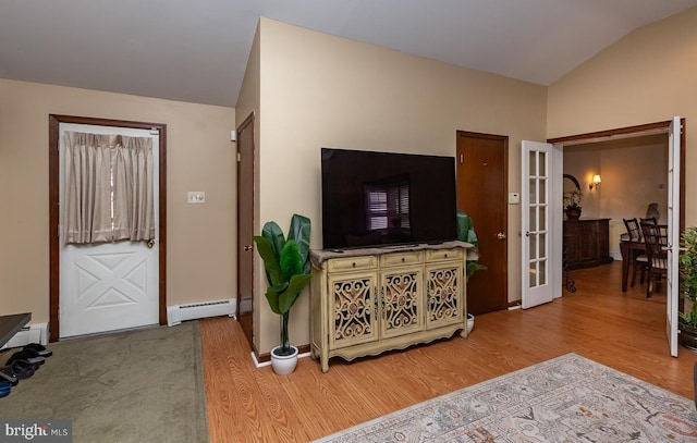 538 Gainsboro Rd, Drexel Hill, PA 19026 - living area with baseboards, baseboard heating, wood finished floors, french doors, and lofted ceiling