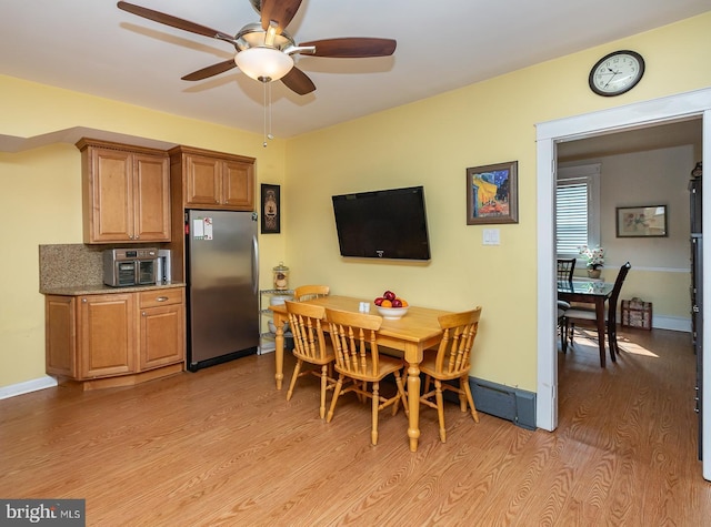 538 Gainsboro Rd, Drexel Hill, PA 19026 - dining room with light wood-type flooring, baseboards, and a ceiling fan
