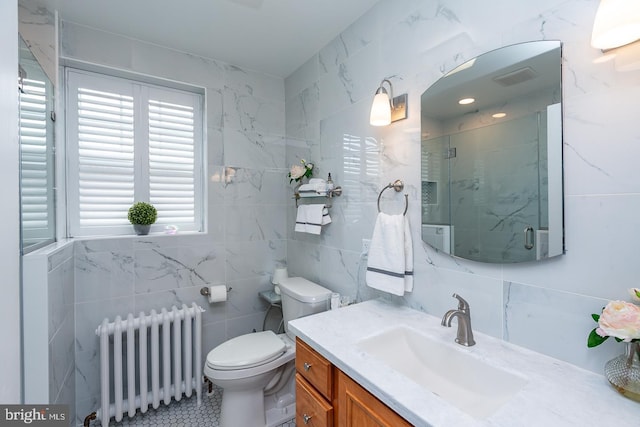 538 Gainsboro Rd, Drexel Hill, PA 19026 - bathroom with tile walls, toilet, radiator, vanity, and a marble finish shower