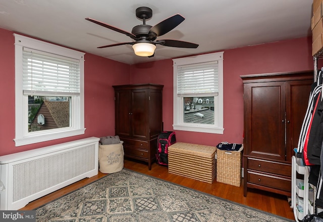 538 Gainsboro Rd, Drexel Hill, PA 19026 - bedroom featuring radiator heating unit, ceiling fan, and wood finished floors