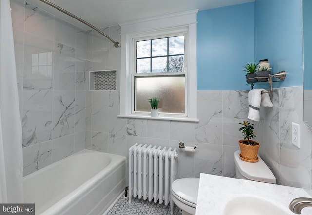 538 Gainsboro Rd, Drexel Hill, PA 19026 - full bathroom with radiator heating unit, shower / tub combination, tile walls, and toilet