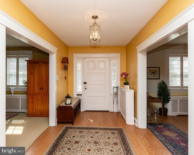 538 Gainsboro Rd, Drexel Hill, PA 19026 - foyer entrance with wood finished floors, baseboards, and plenty of natural light