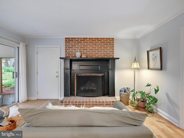 506 Devonshire Ln, Severna Park, MD 21146 - living area featuring wood finished floors, crown molding, and a fireplace