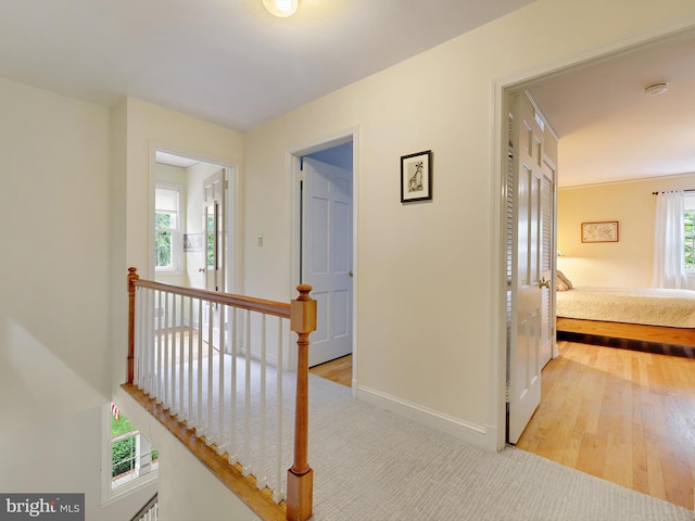 506 Devonshire Ln, Severna Park, MD 21146 - hallway featuring an upstairs landing and wood finished floors
