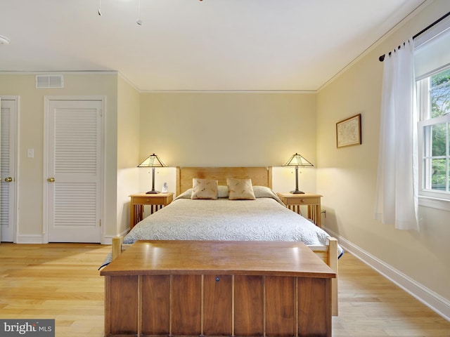 506 Devonshire Ln, Severna Park, MD 21146 - bedroom with light wood finished floors and crown molding
