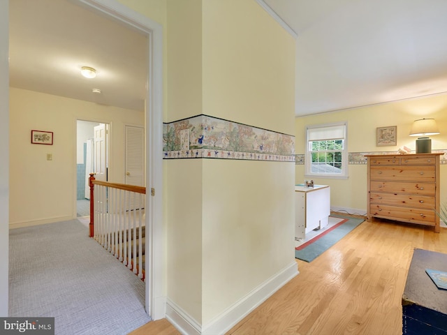 506 Devonshire Ln, Severna Park, MD 21146 - corridor featuring light wood-style flooring and an upstairs landing