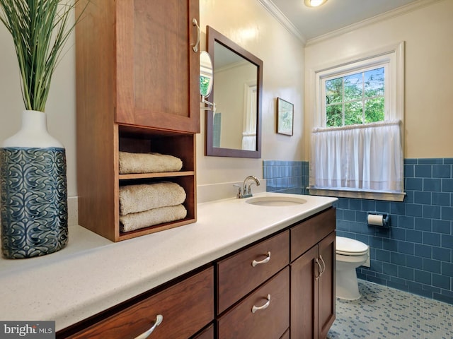 506 Devonshire Ln, Severna Park, MD 21146 - bathroom with tile walls, vanity, a wainscoted wall, ornamental molding, and tile patterned floors